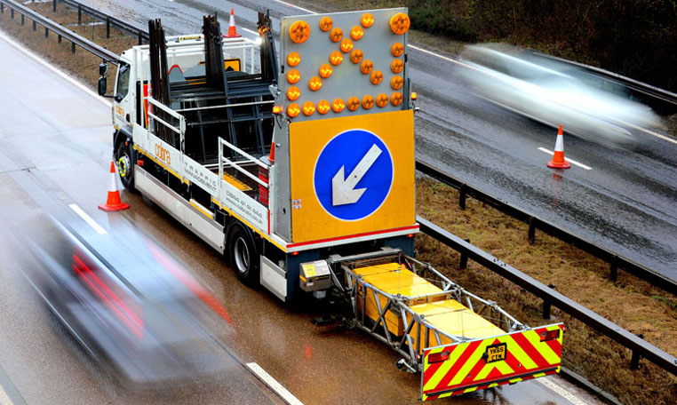A Cobra Traffic Management impact prevention vehicle at work on a high speed traffic management job