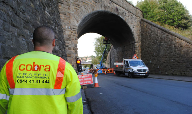 Cobra traffic management provide temporary traffic signals and safely secure a working area for a bridge repair